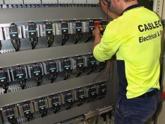 Electrical Technician Testing Existing Controls